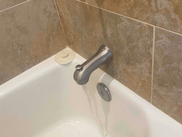 Bathtub faucet and drain