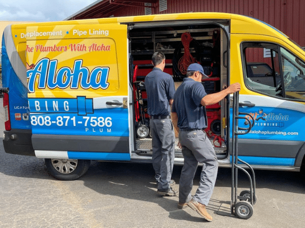 All Aloha Plumbing technicians with hydro jetting equipment at their van